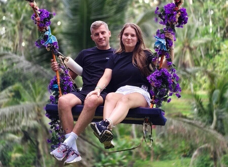Traveler enjoying the Bali Swing Ubud overlooking lush jungle scenery